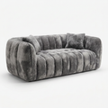Vue trois-quarts gauche avec deux coussins gris assortis